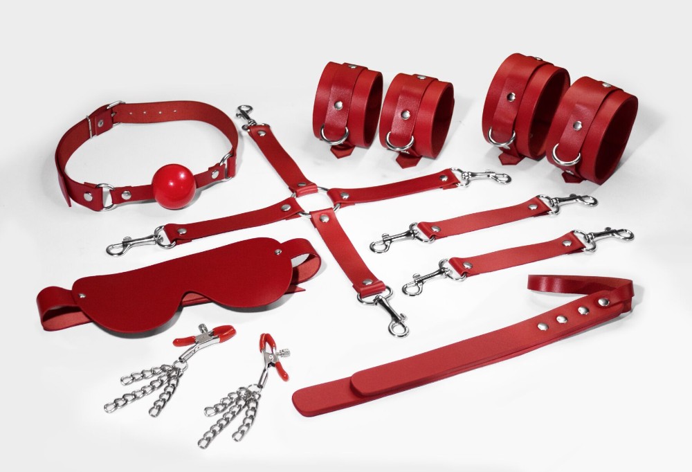 Набір Feral Feelings BDSM Kit 7 Red, наручники, поножі, конектор, маска, падл, кляп, затискачі - зображення 1